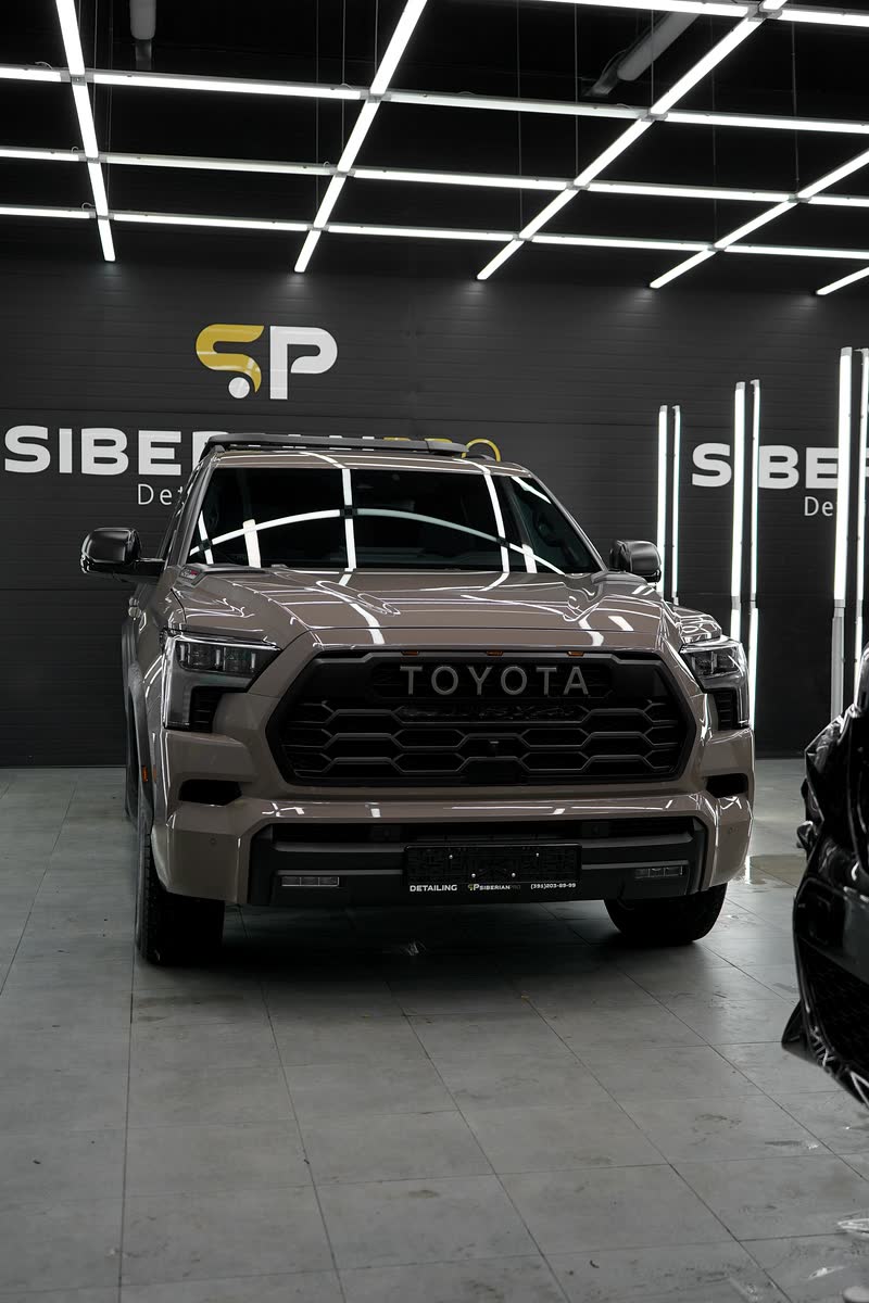Toyota Sequoia TRD Pro перед логотипом студии
